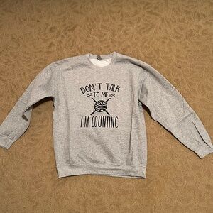 Graphic sweater, size L